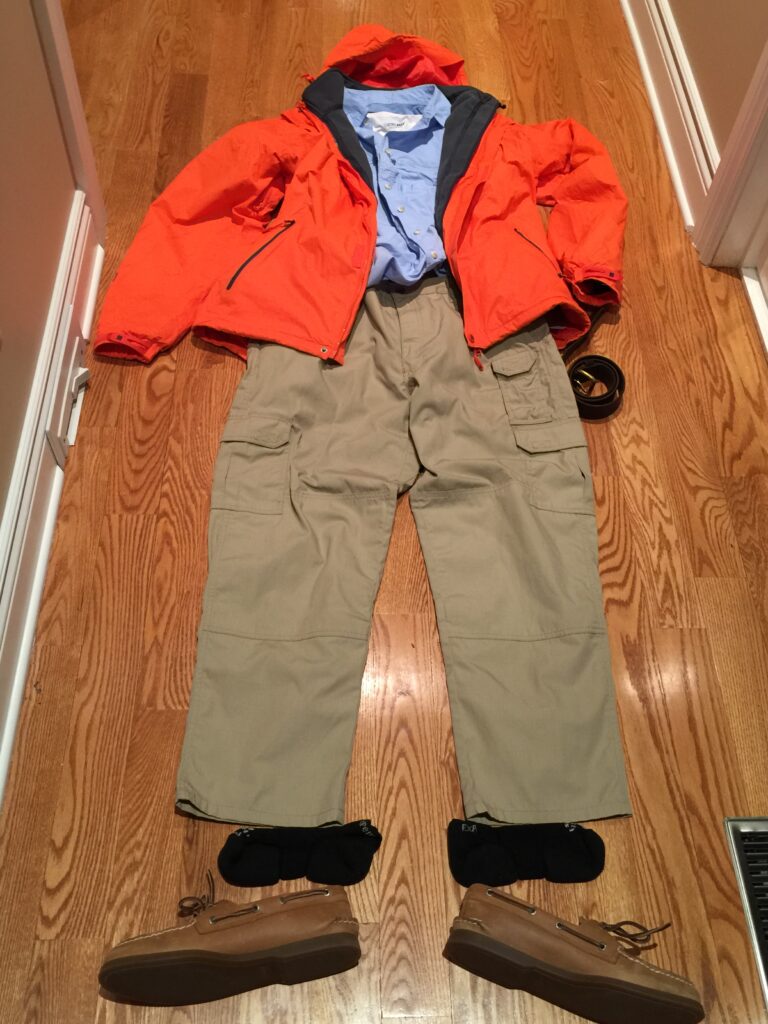 What my husband will be wearing on the plane tomorrow - bulky items best left out of his carry-on