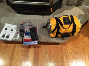 The yellow water bag contains all of the gear, except what you see on the left