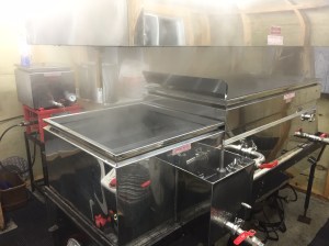 Sugar shack interior, containing evaporator and bottling equipment
