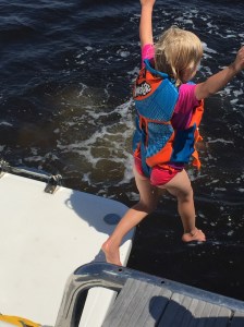 Karen (age 4), previously timid in the water, can now leap into the water from the back of our catamaran.