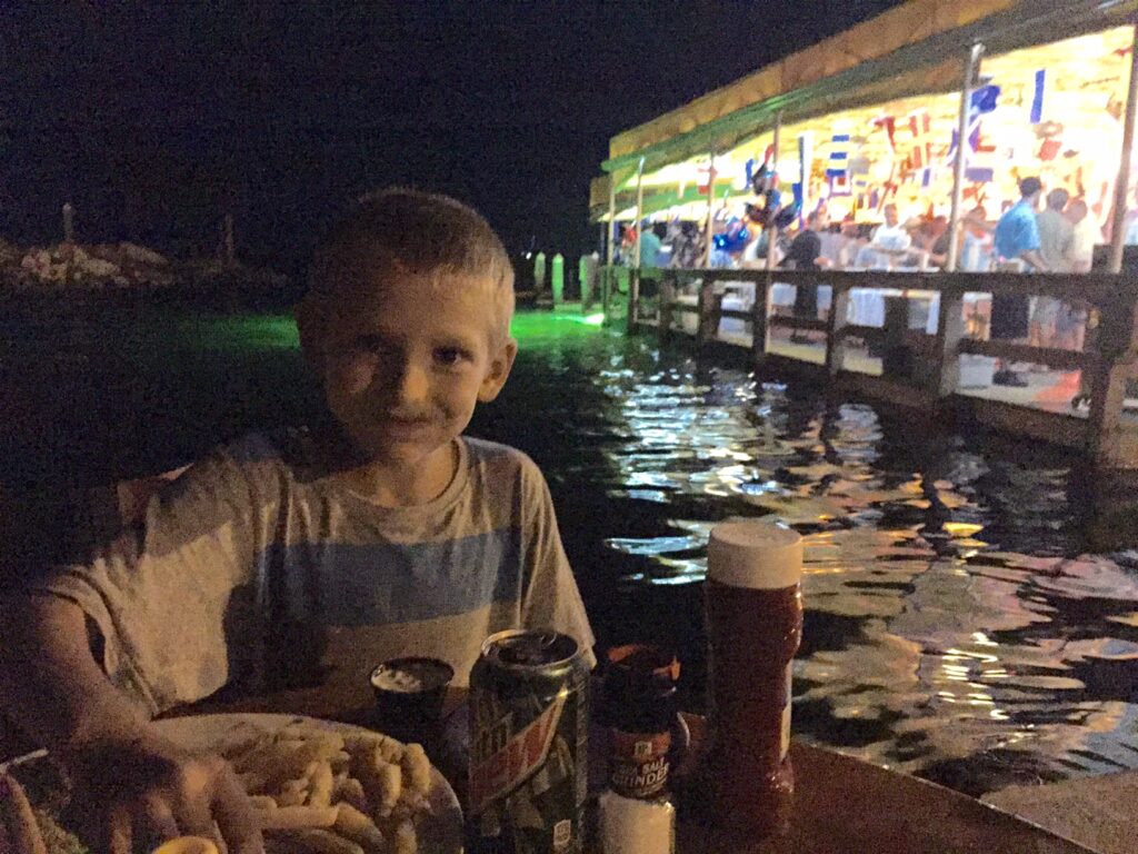 Florida Keys Sailing: Paul enjoys a dockside supper outside the Island Grill at Mandalay, Key Largo.