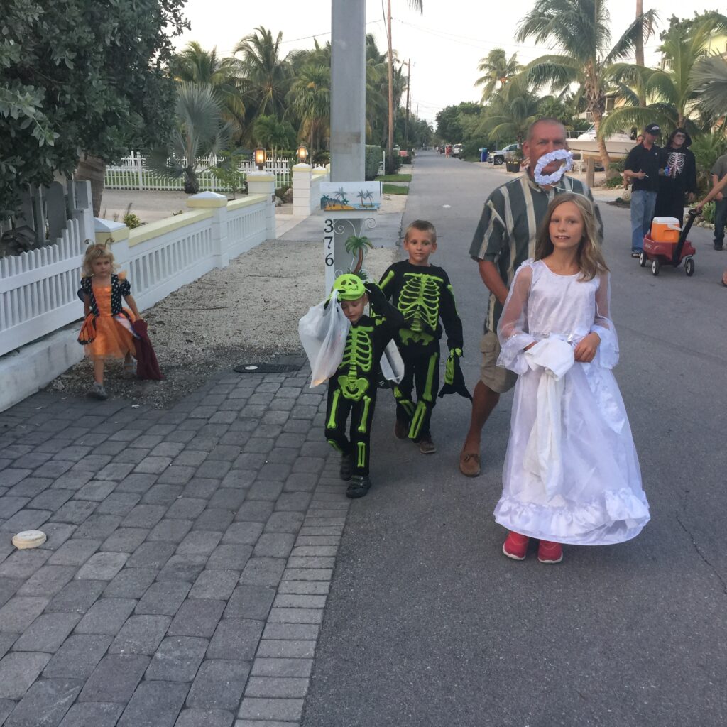 Halloween in Tavernier: Our kids with my husband, Rick. Tavernier, Florida 2015.