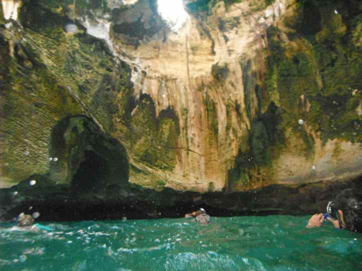 Inside Thunderball Grotto, a cave that you can enter at low tide at Staniel Cay, Bahams.