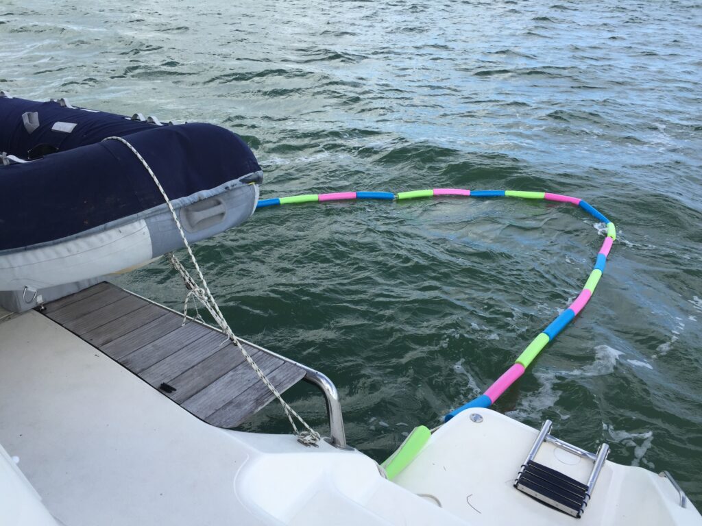 catamaran safety: two hulls mean two attachement points for the pool noodle swim enclosure