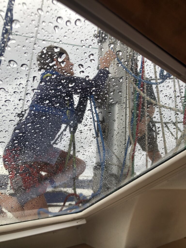 Heavy weather sailing: Paul on the deck of SV Aphrodite