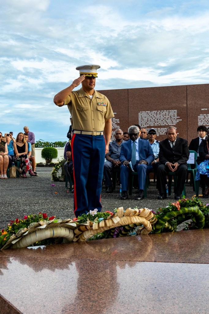 U.S. Marine Corps Lt. Col. Robert J. Hillery, commanding officer of Task Force Koa Moana 23 salutes at the 81st Anniversary of the Battle of Guadalcanal Ceremony in Honiara, Solomon Islands