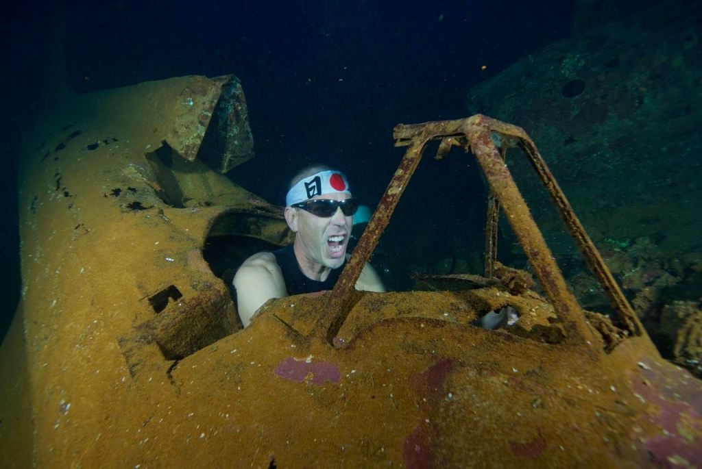 Todd underwater in a Japanese plane
