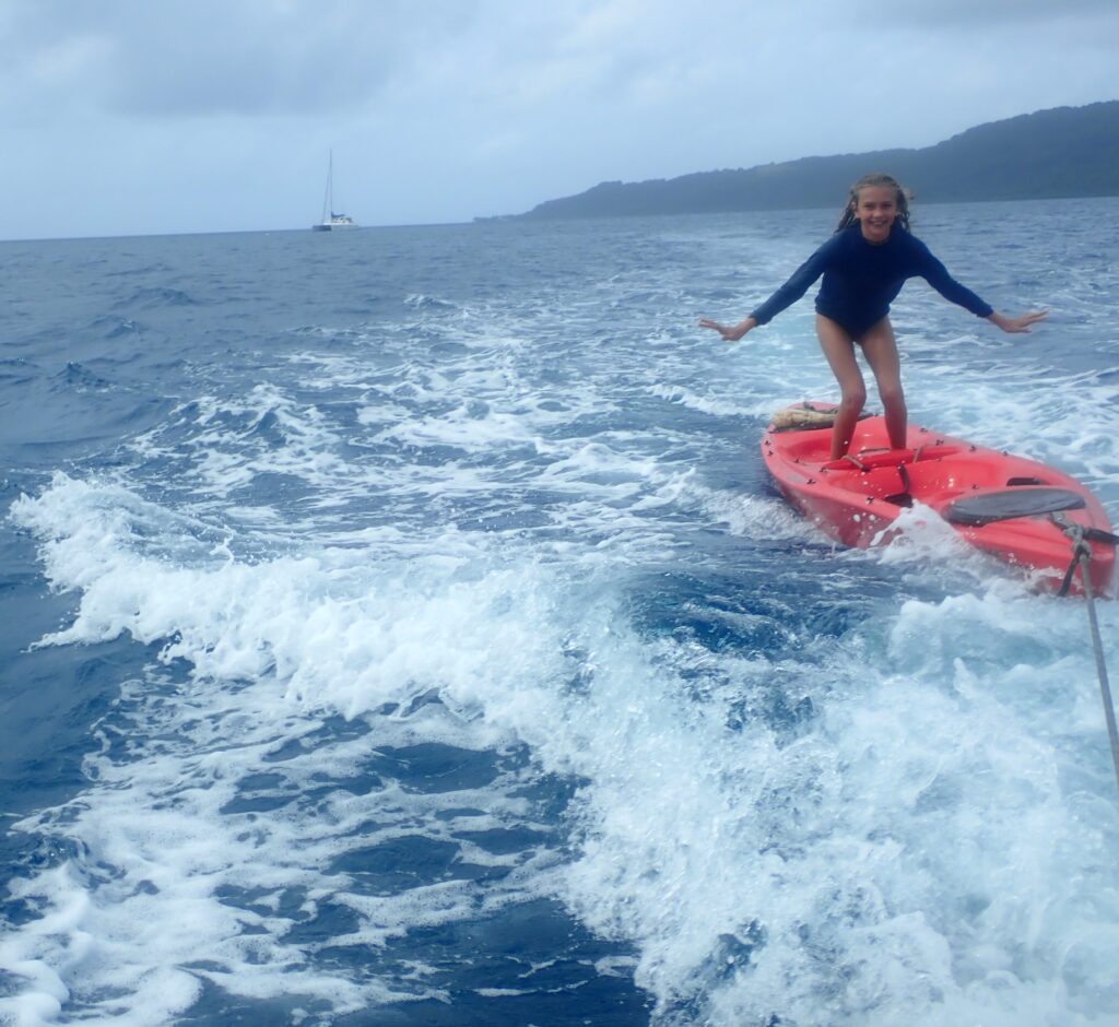 Karen waterskiing on a kayak