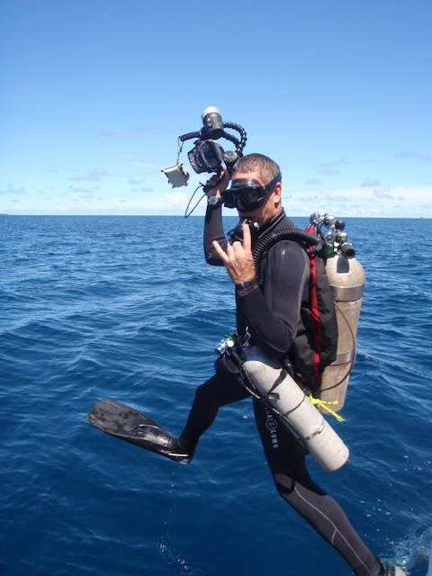 Todd with his photography equipment in Micronesia