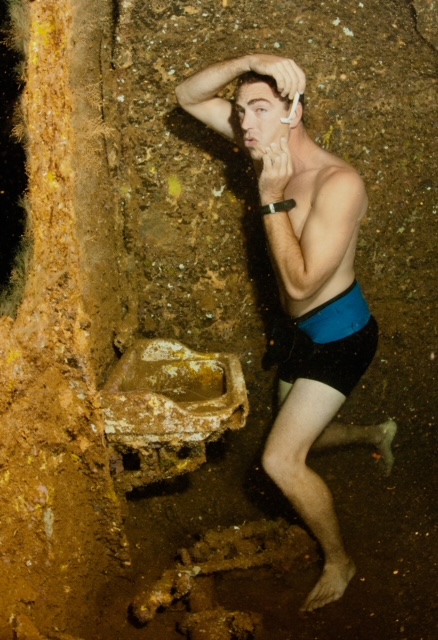 Todd shaving in a WW2 Wreck in Chuuk, Micronesia