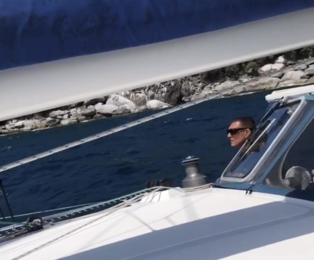 Captain Rick at the helm of SV Aphrodite overseeing our Mantus Anchor retrieval.