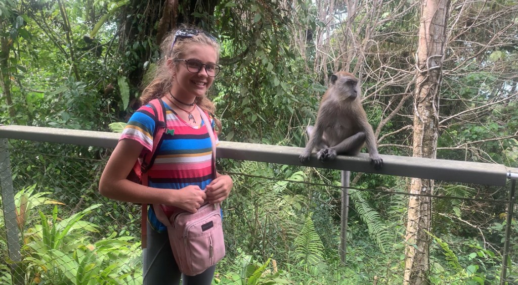 Karen Escher with a Long-tailed Macaque Monkey at Penang Hill, Malaysia.