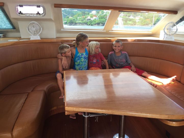 Photo of Escher kids on SV Aphrodite on the Ultraleather saloon cushions after slightly less than two years of use.