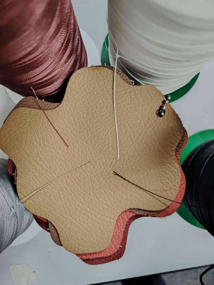 The leather we chose for our saloon cushions with four different thread options.