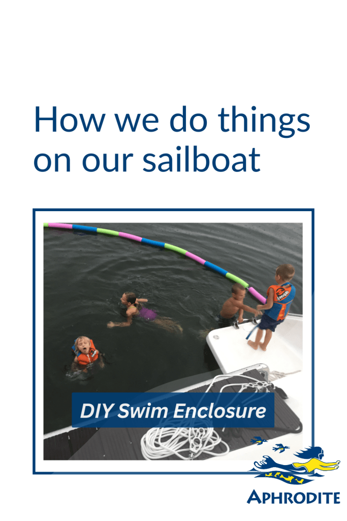 A picture of our kids in our first and rather genius DIY swim enclosure, made of pool noodles, that we put behind our boat, SV Aphrodite, a St. Francis 50 catamaran.