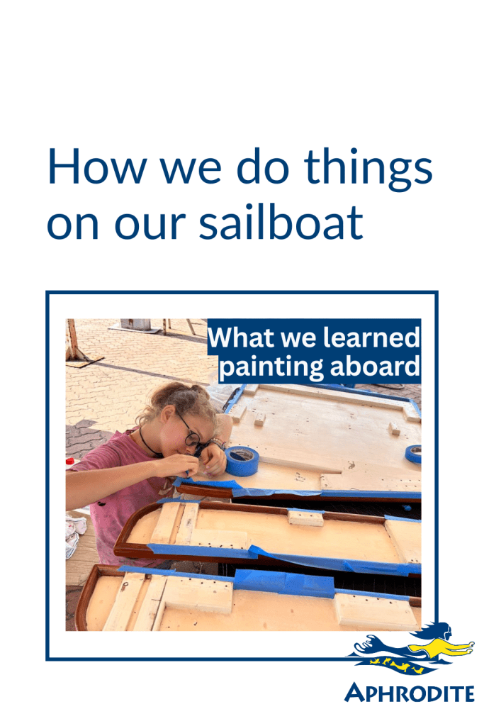 Karen painting under our St. Francis 50 catamaran, SV Aphrodite at Lunas Shipyard in Langkawi, Malasyia.