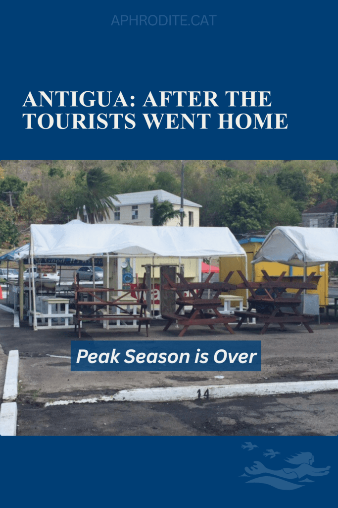 Empty, overturned picnic tables in Antigua, a day after the end of Antigua Sailing Week signals that peak season is over.