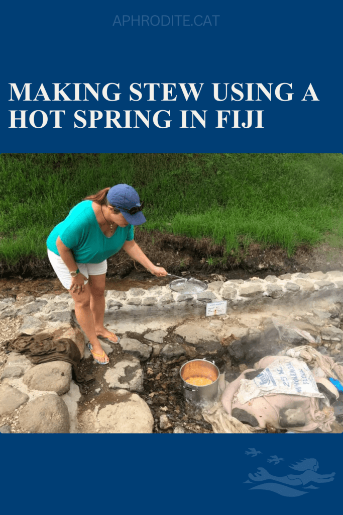 Our friend and fellow cruiser Julia cooking lunch in a geothermal vent in Savusavu, Fiji.