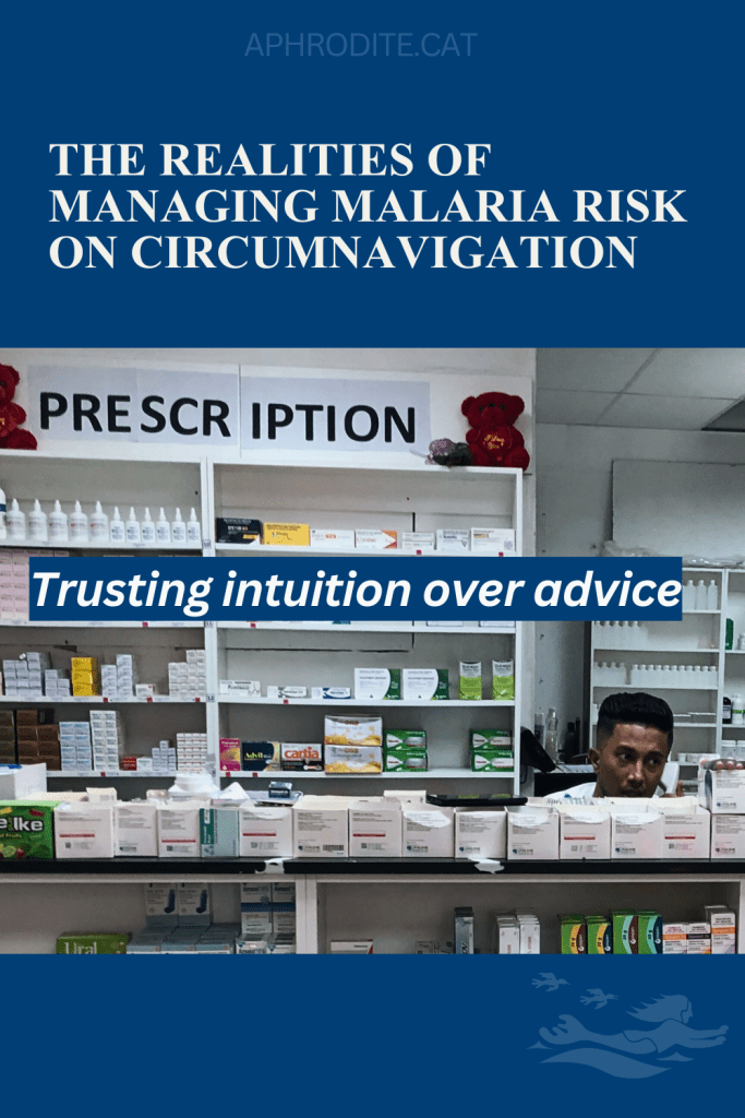 A pharmacist in Fiji behind a counter of medicines when we bought Malaria medicine for our trip to The Solomon Islands and Papua New Guinea.