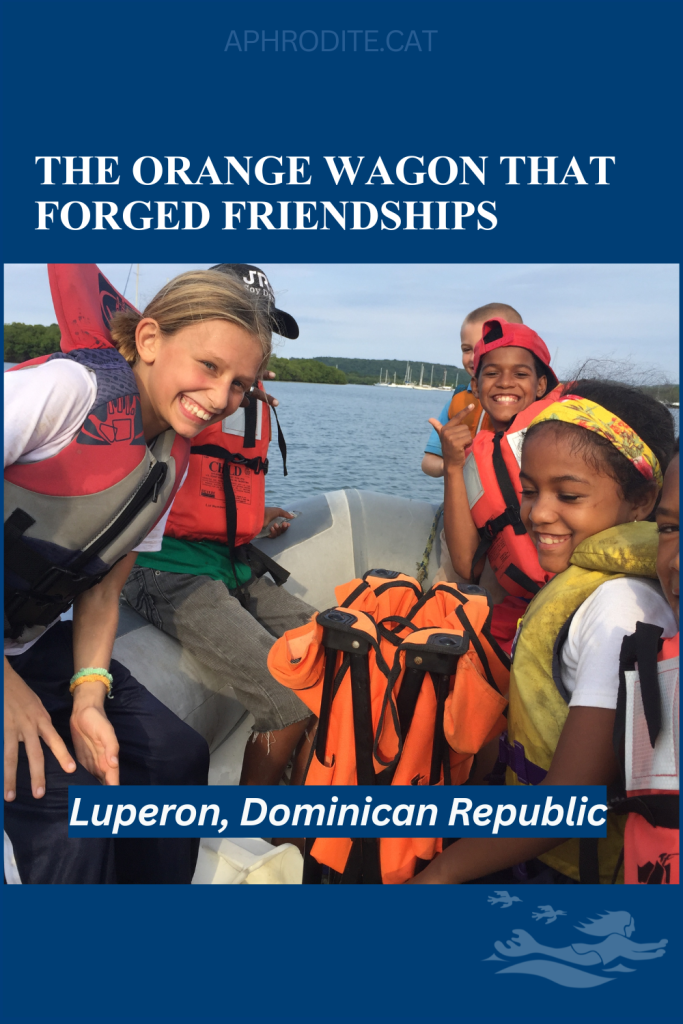 Our kids with some local kids from Luperon on a trip out to our sailboat, SV Aphrodite by catamaran.