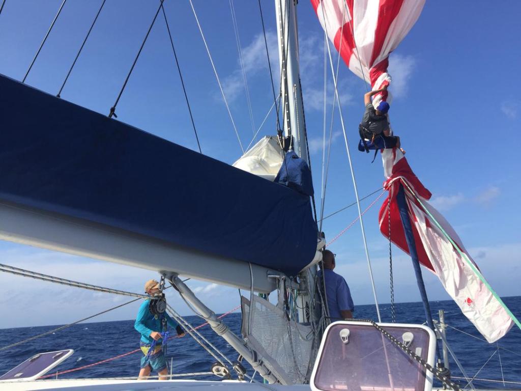 Paul rescuing our Spinnaker on SV Aphrodite.