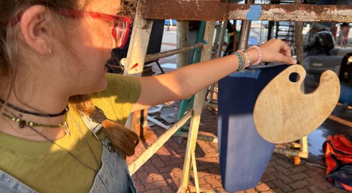 Karen with her wooden artist's palette