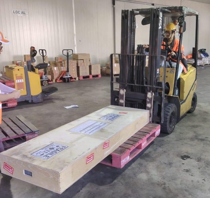 Corian countertop crate with a forklift at Lunas Shipyard, Langkawi, Malaysia