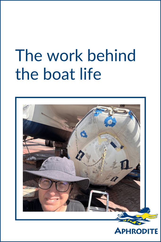 A picture of me in front of the dinghy of SV Aphrodite during repairs at Lunas Shipyard in Langkawi, Malaysia.