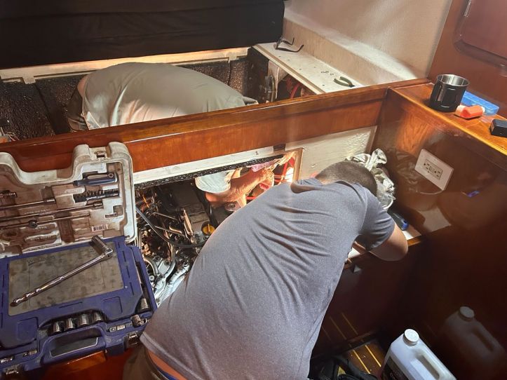 Henry and Rick as they serrvice a Yanmar engine on our St. Francis 50 catamaran. 