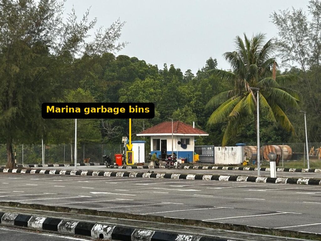 Garbage disposal bin location near the security gate at Pulau Indah Marina