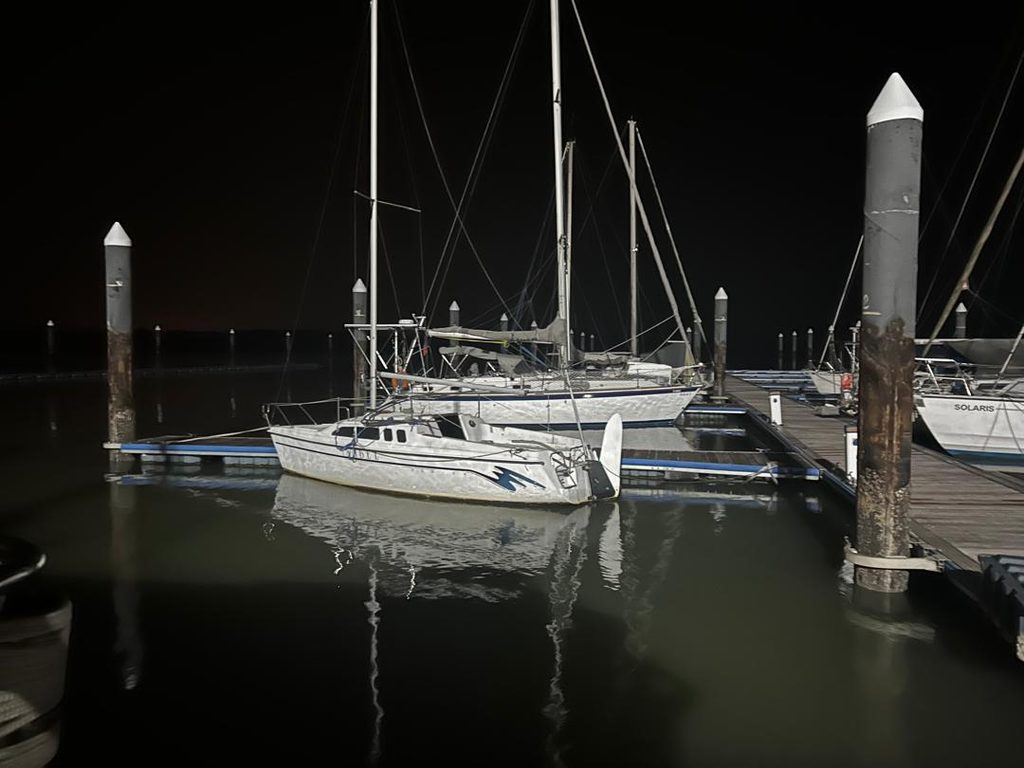 Sailboat at night at Pulau Indah Marina